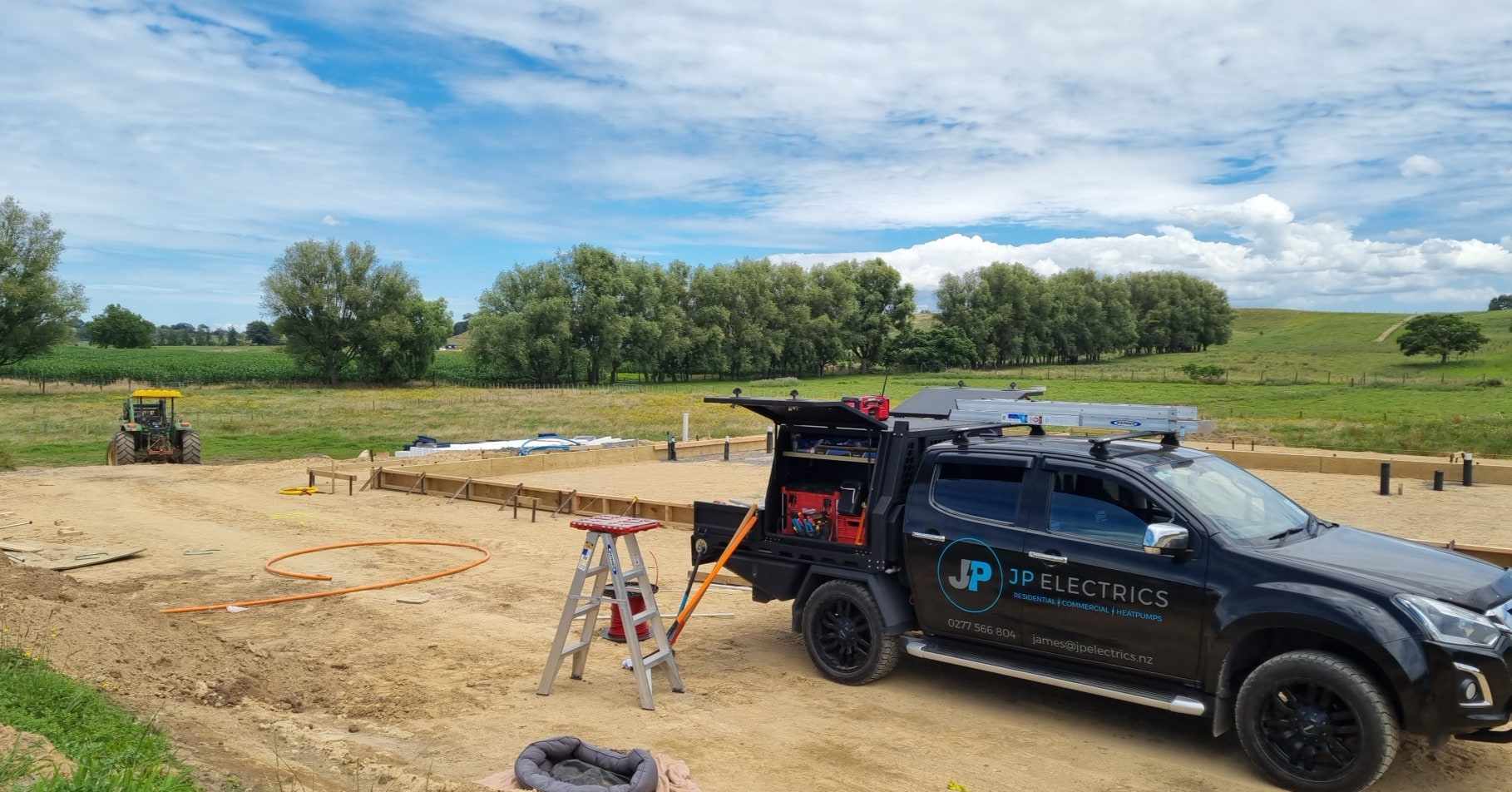 Building site with JP Electrics work vehicle