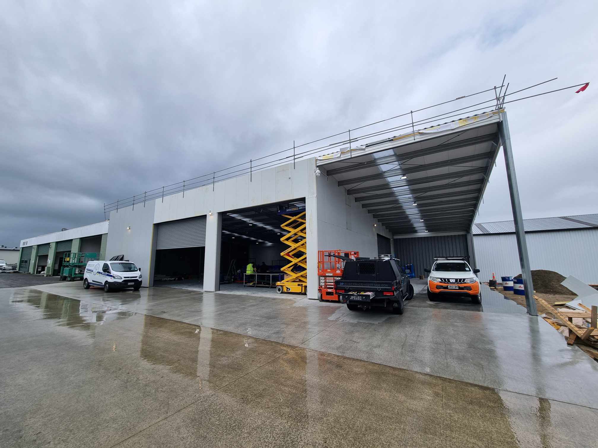 Commercial building canopy with new LED lighting installation