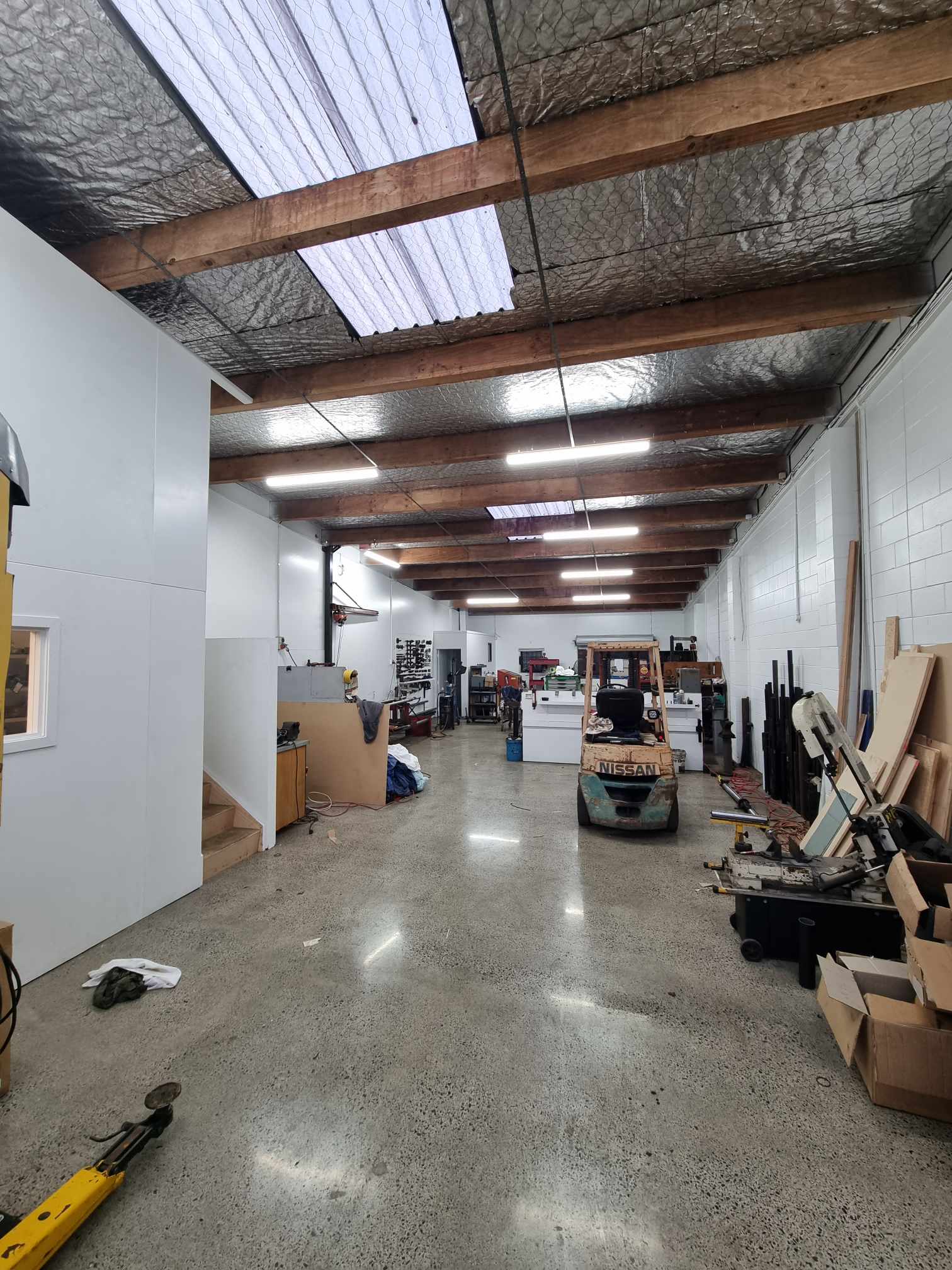 Workshop upgraded with LED batten lighting under a skillion roof